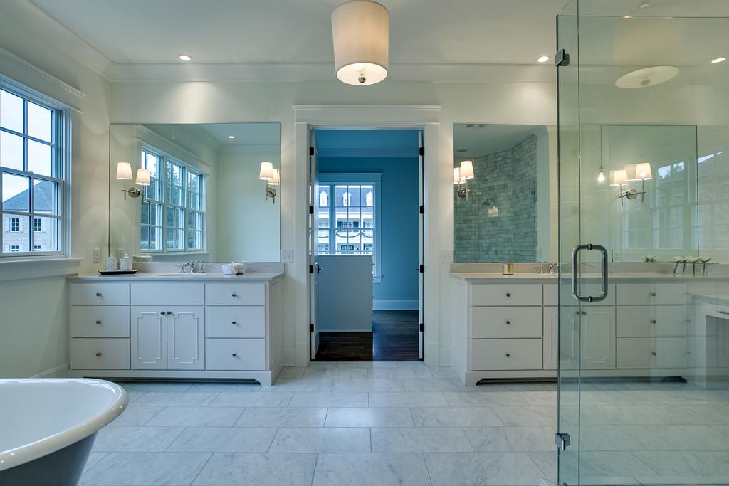 1205 Echo Lane Franklin, TN 37069 - Photo 22 of 29 a spacious bathroom with a granite countertop sink mirror and a