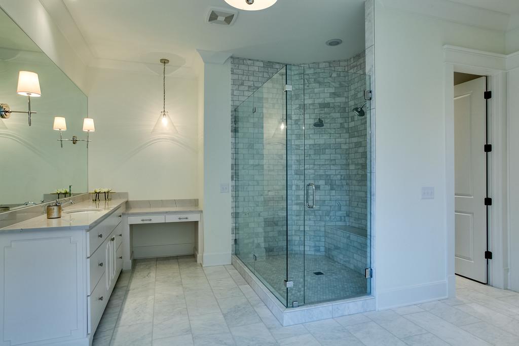 1205 Echo Lane Franklin, TN 37069 - Photo 23 of 29 a bathroom with a shower sink and mirror