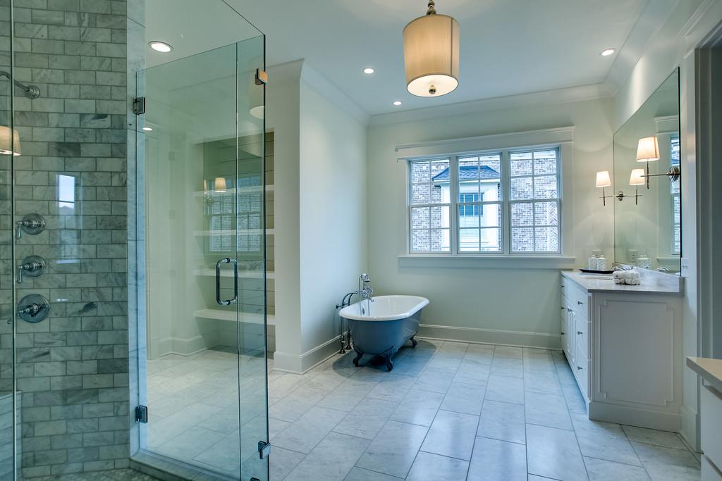 1205 Echo Lane Franklin, TN 37069 - Photo 24 of 29 a bathroom with a toilet sink and shower