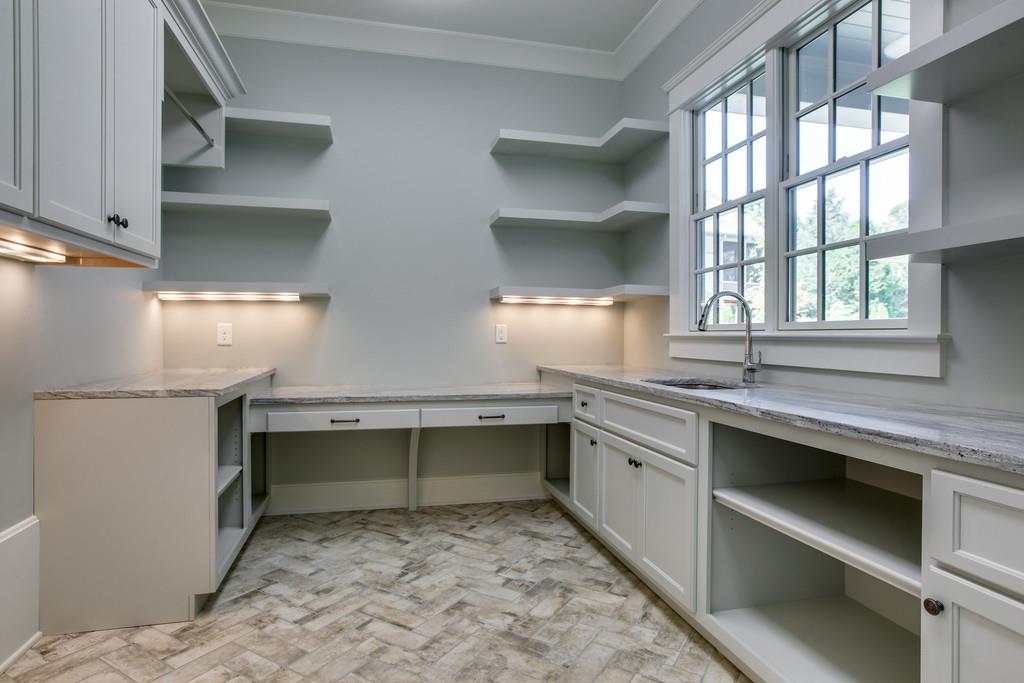 1205 Echo Lane Franklin, TN 37069 - Photo 25 of 29 a view of a kitchen with a sink and dishwasher in it