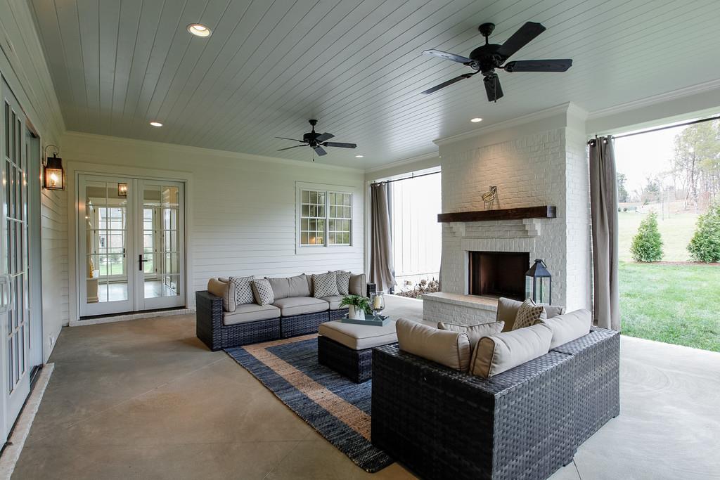 1205 Echo Lane Franklin, TN 37069 - Photo 28 of 29 a living room with furniture and a fireplace