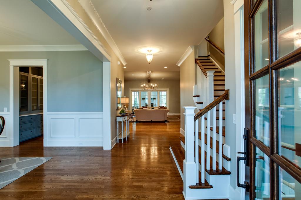 1205 Echo Lane Franklin, TN 37069 - Photo 4 of 29 a view of gallery with wooden floor and stairs