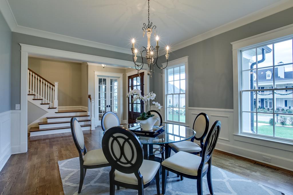 1205 Echo Lane Franklin, TN 37069 - Photo 6 of 29 a view of a dining room with furniture window and wooden floor