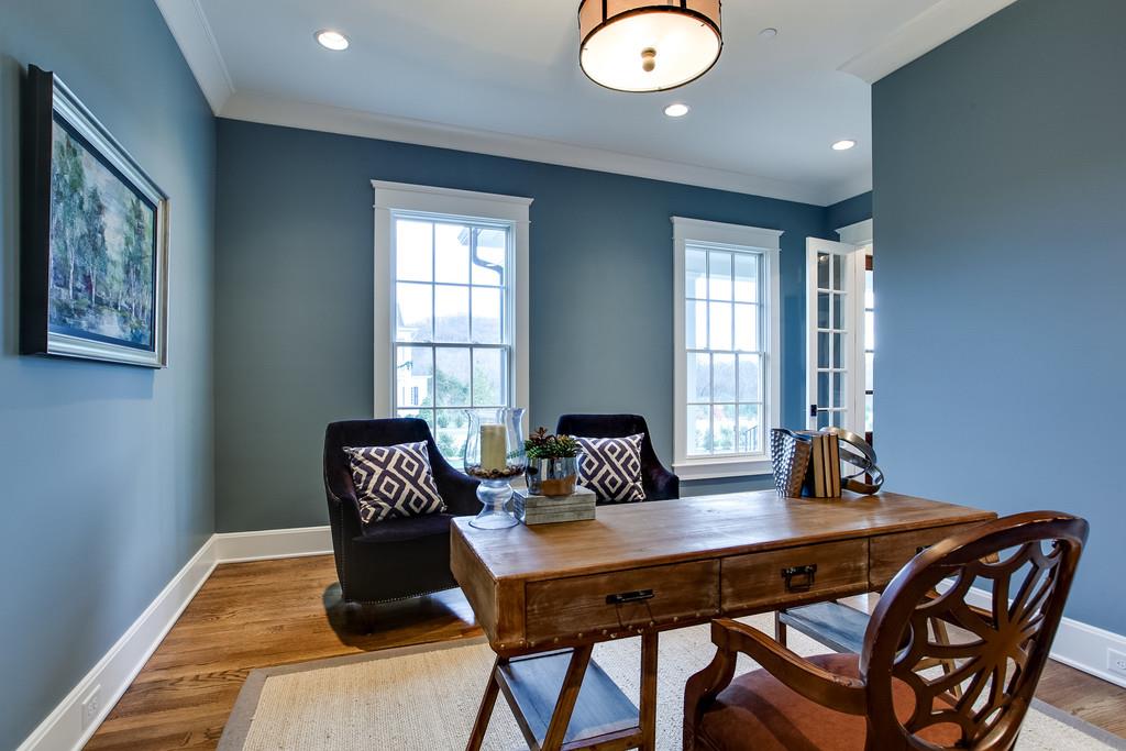 1205 Echo Lane Franklin, TN 37069 - Photo 7 of 29 a view of a dining room with a table and chairs
