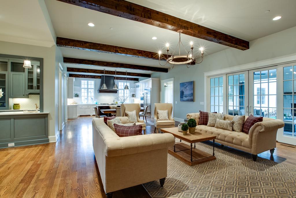 1205 Echo Lane Franklin, TN 37069 - Photo 10 of 29 a living room with furniture and a wooden floor
