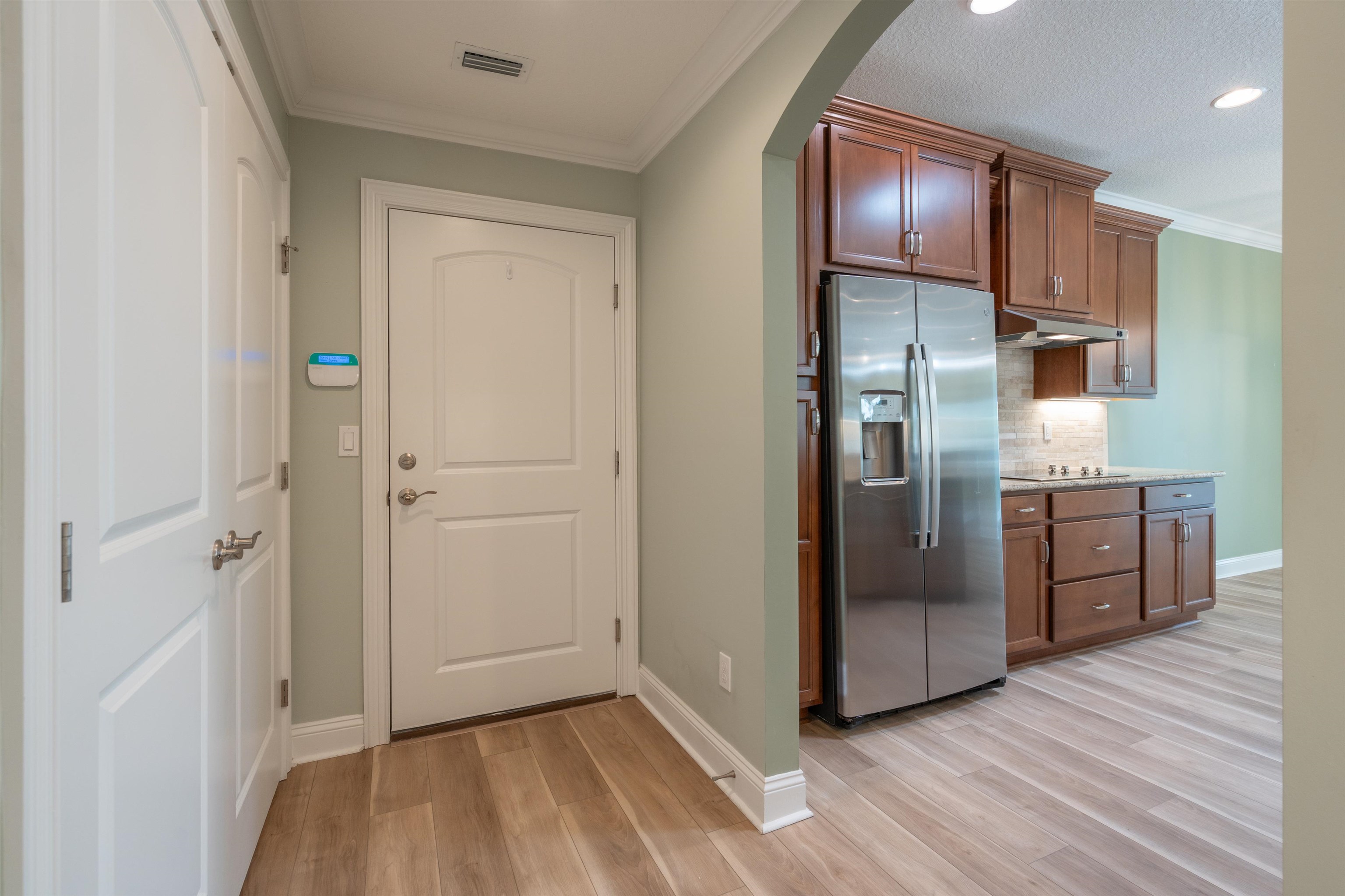 148 Timoga Trail St. Augustine, FL 32084 - Photo 20 of 46 a kitchen with stainless steel appliances granite countertop a refrigerator and a sink