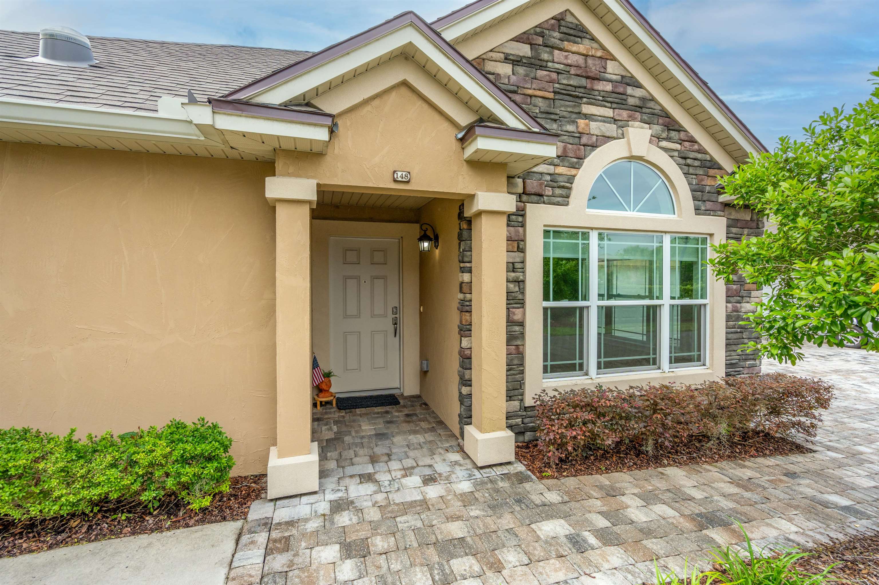 148 Timoga Trail St. Augustine, FL 32084 - Photo 2 of 46 a view of a house with backyard and garden