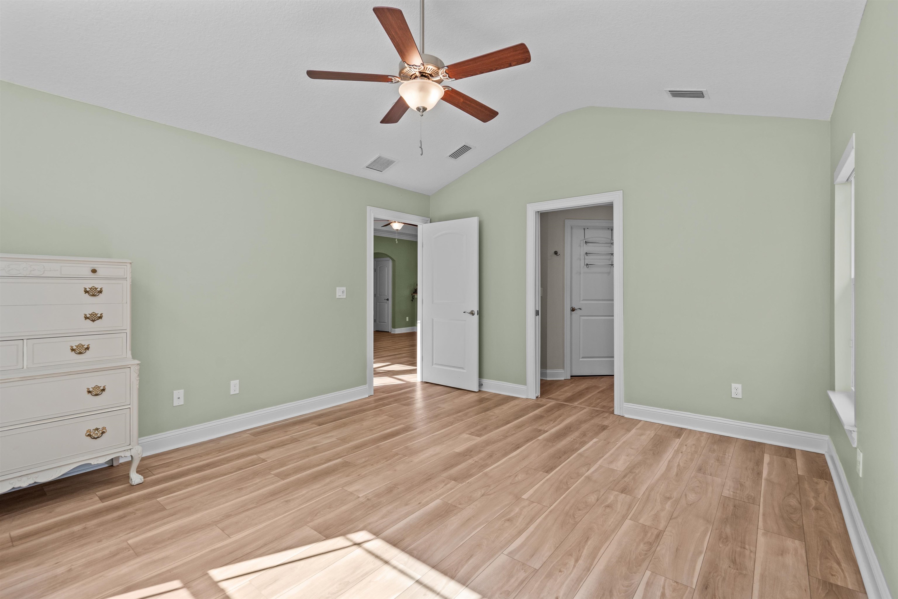 148 Timoga Trail St. Augustine, FL 32084 - Photo 26 of 46 wooden floor in an empty room with a window