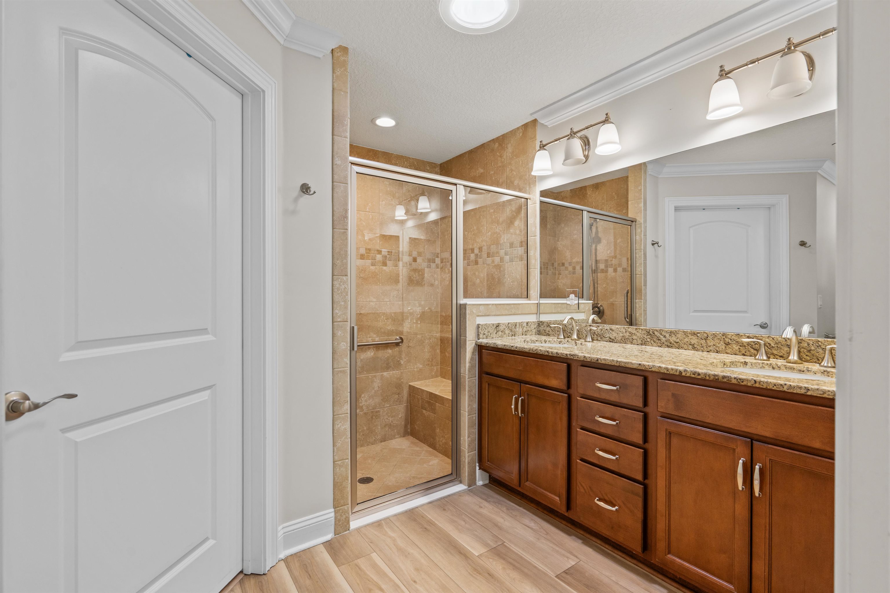 148 Timoga Trail St. Augustine, FL 32084 - Photo 27 of 46 a bathroom with a granite countertop sink mirror and double