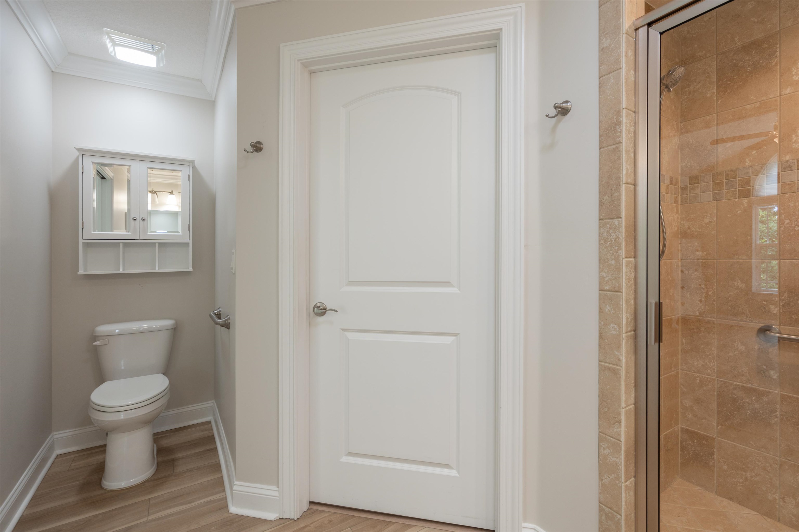 148 Timoga Trail St. Augustine, FL 32084 - Photo 28 of 46 a white toilet sitting next to a bathroom sink