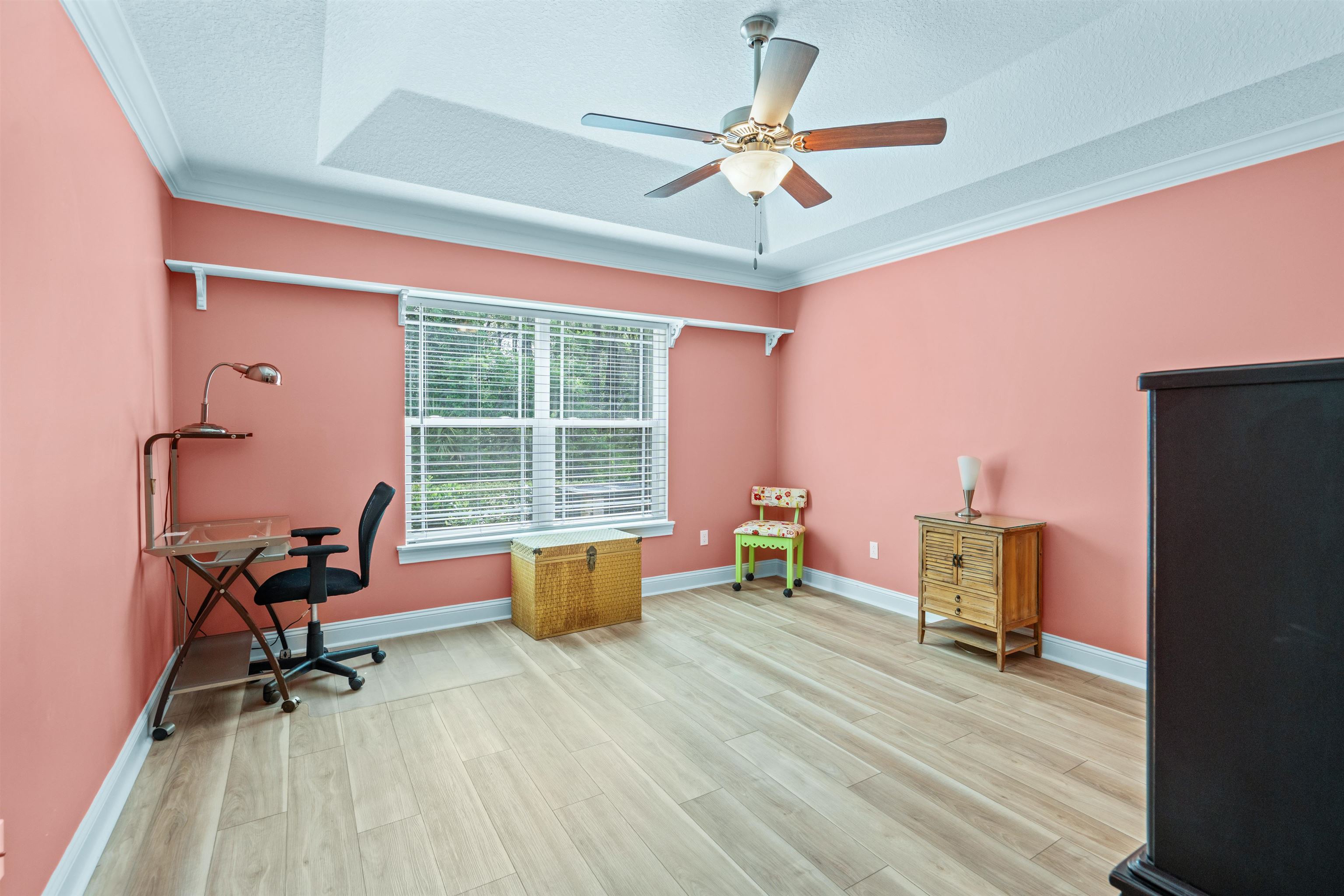 148 Timoga Trail St. Augustine, FL 32084 - Photo 29 of 46 a living room with furniture and a wooden floor