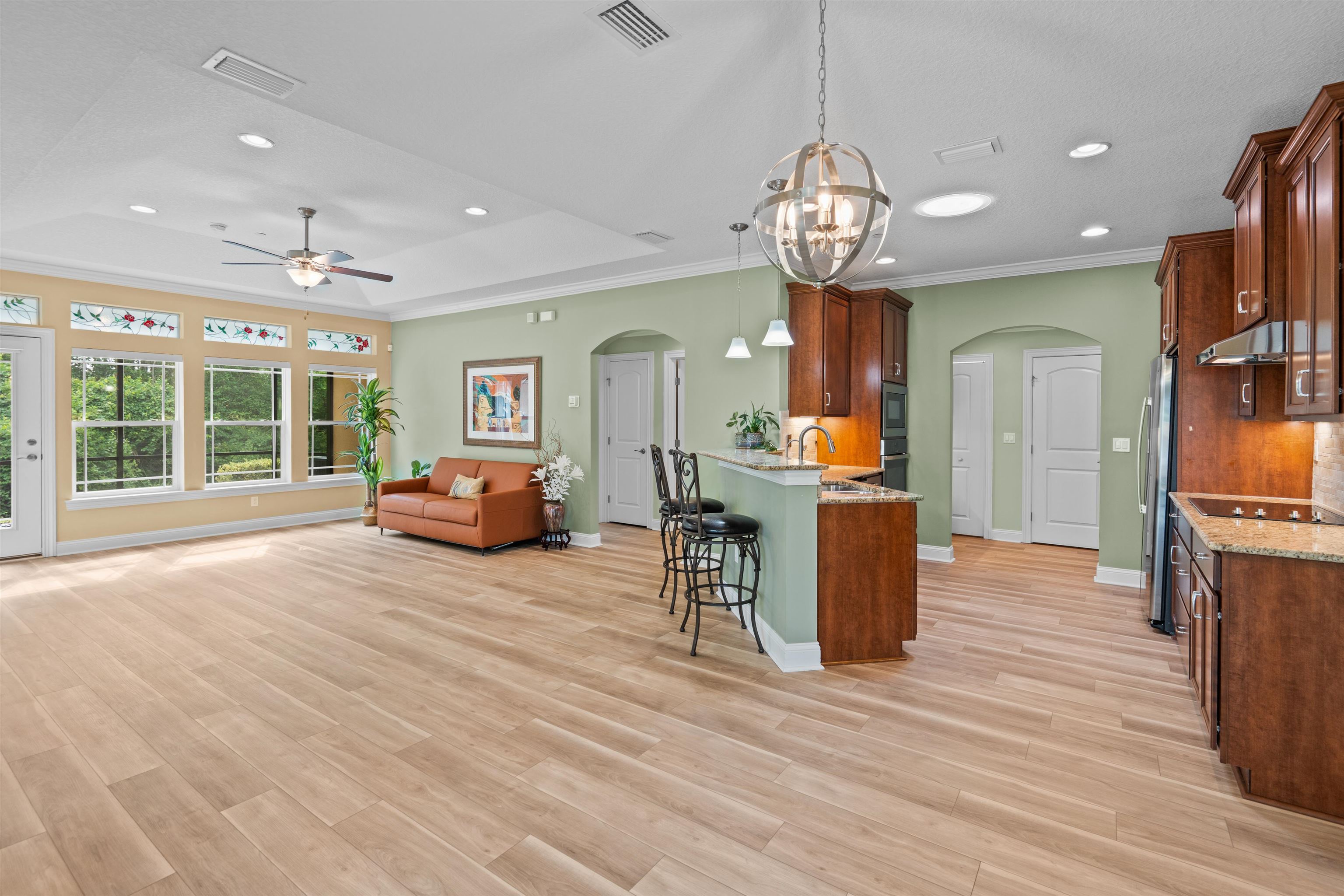 148 Timoga Trail St. Augustine, FL 32084 - Photo 4 of 46 a view of a dining room with furniture window and wooden floor