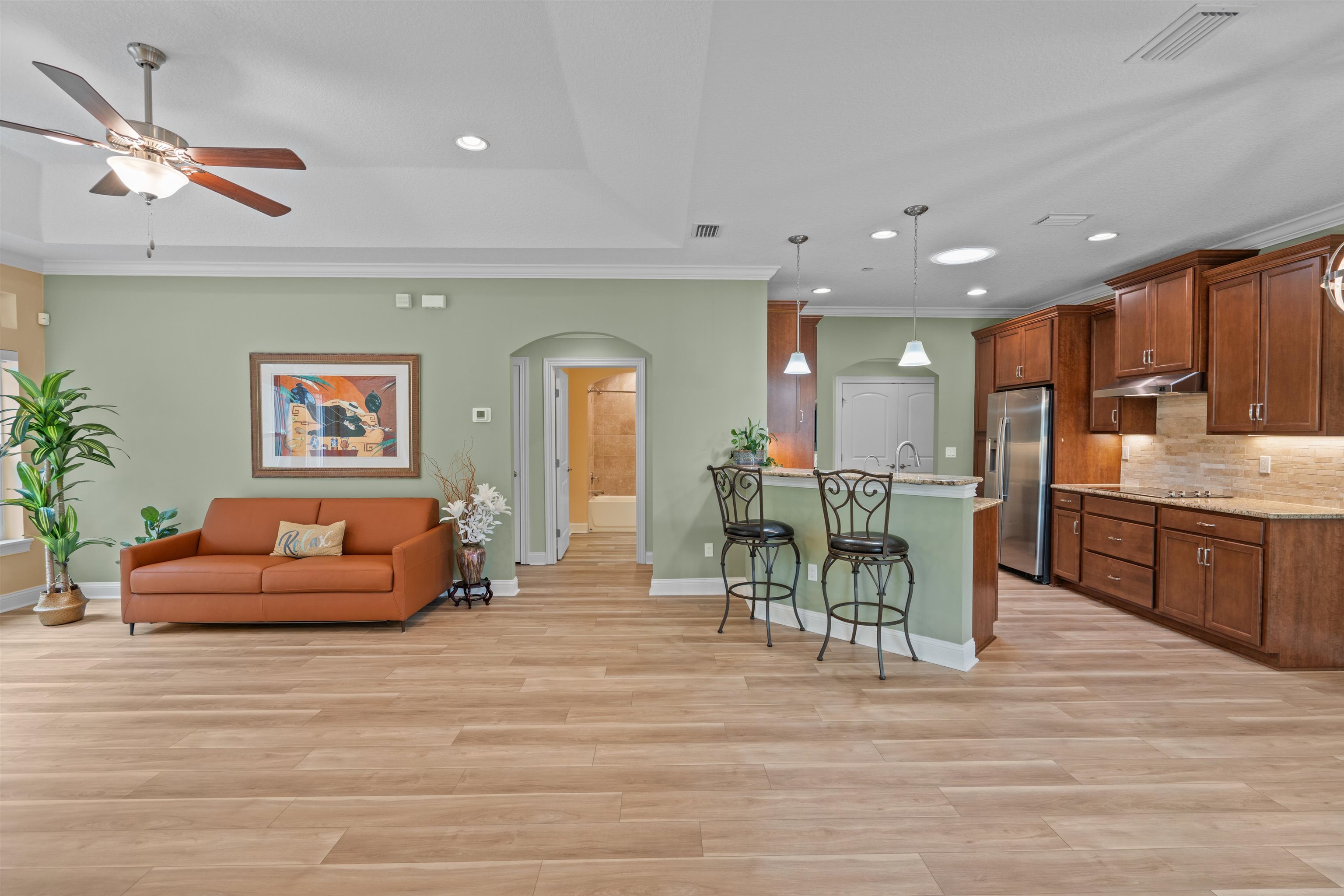 148 Timoga Trail St. Augustine, FL 32084 - Photo 5 of 46 a living room with furniture and kitchen view