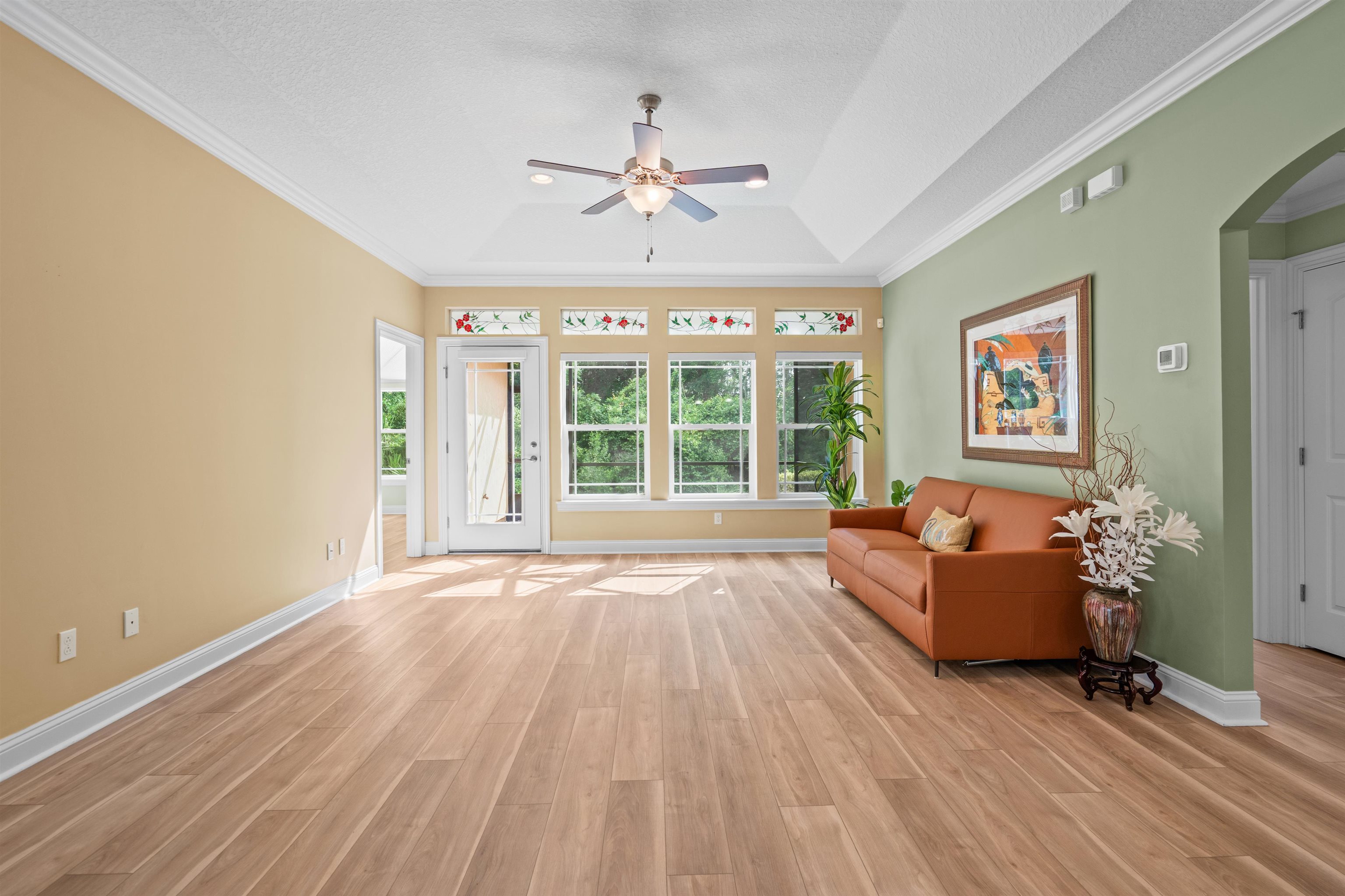 148 Timoga Trail St. Augustine, FL 32084 - Photo 6 of 46 a living room with furniture and large windows
