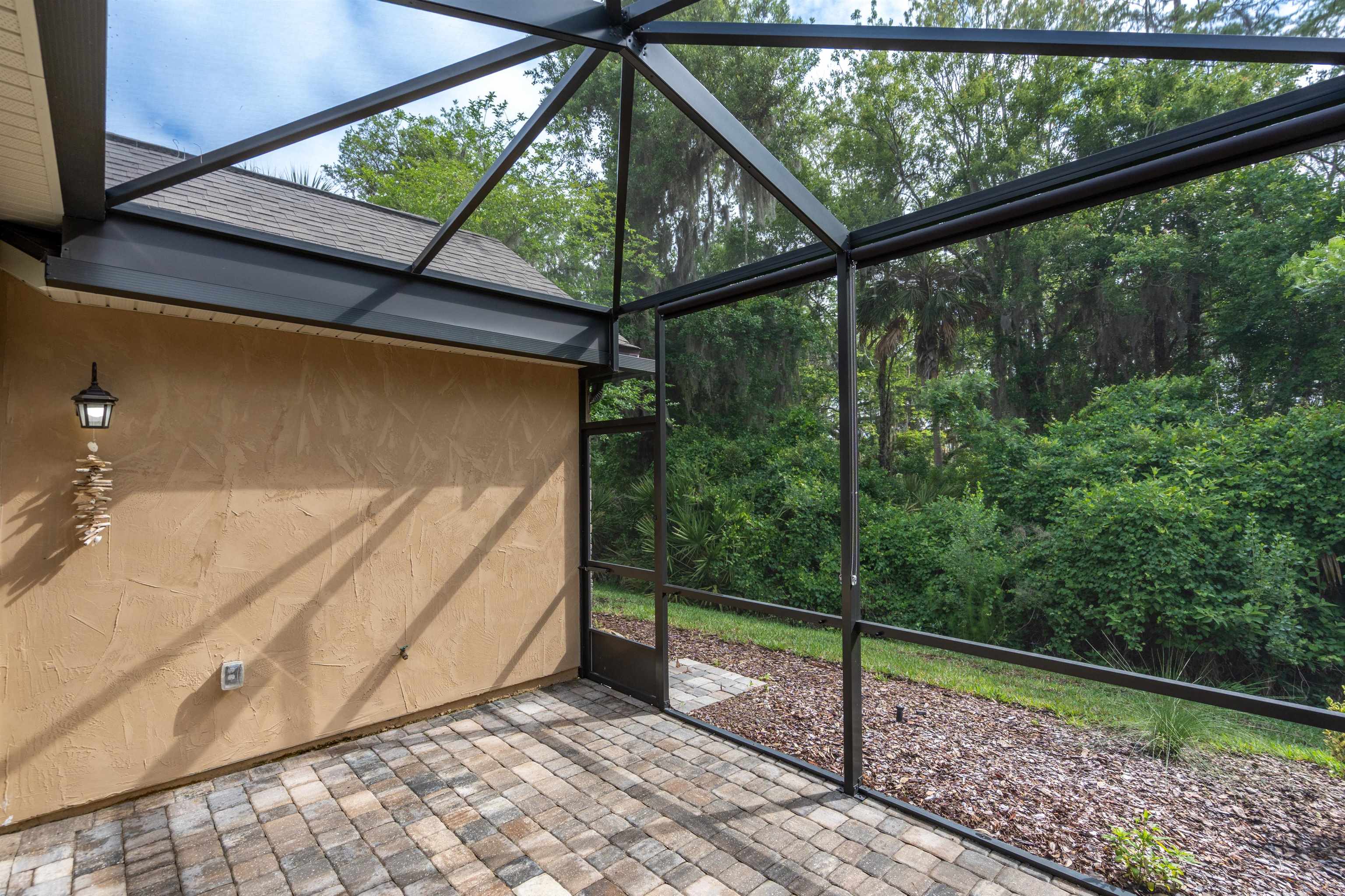 148 Timoga Trail St. Augustine, FL 32084 - Photo 8 of 46 a view of a house with a yard