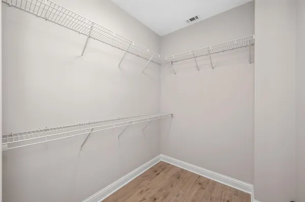 a view of a room with racks on the wall