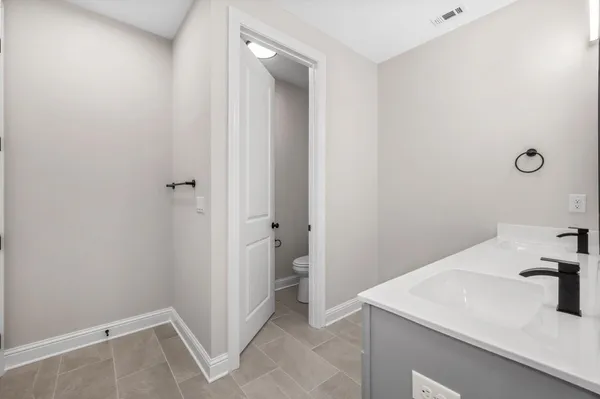a bathroom with a sink and a vanity