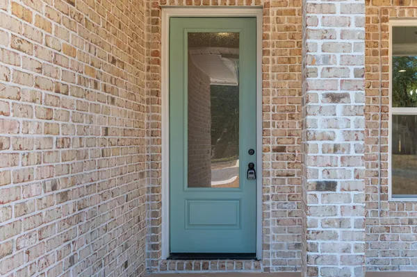 a bathroom with a shower and a sink