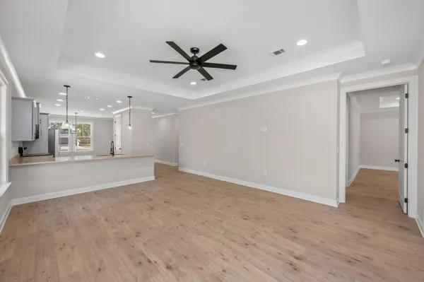 a view of a livingroom with a ceiling fan