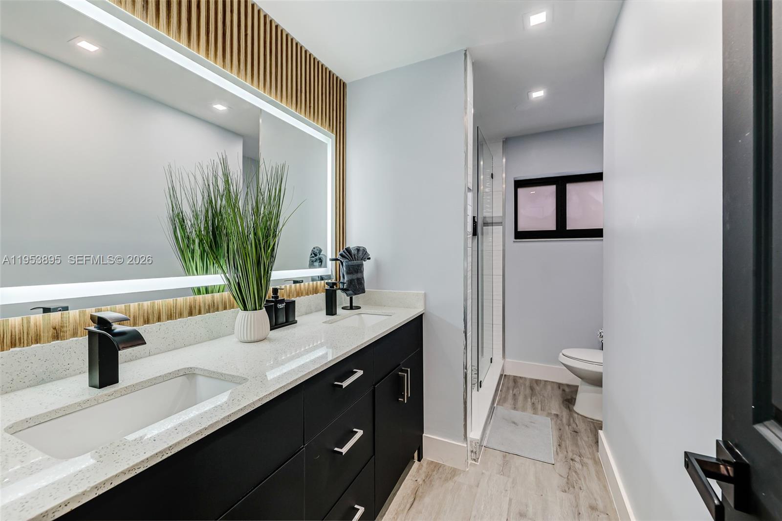 10870 Southwest 106th Avenue Miami, FL 33176 - Photo 24 of 48 a bathroom with a double vanity sink and a mirror