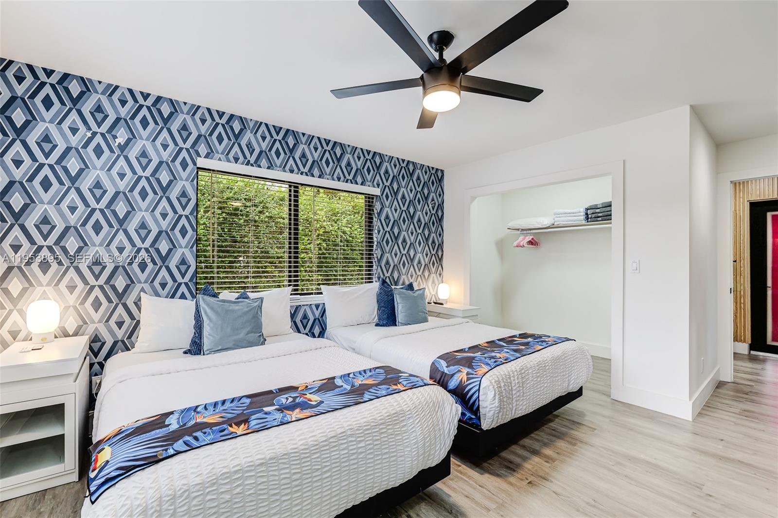 10870 Southwest 106th Avenue Miami, FL 33176 - Photo 27 of 48 a bedroom with a large bed and a large window