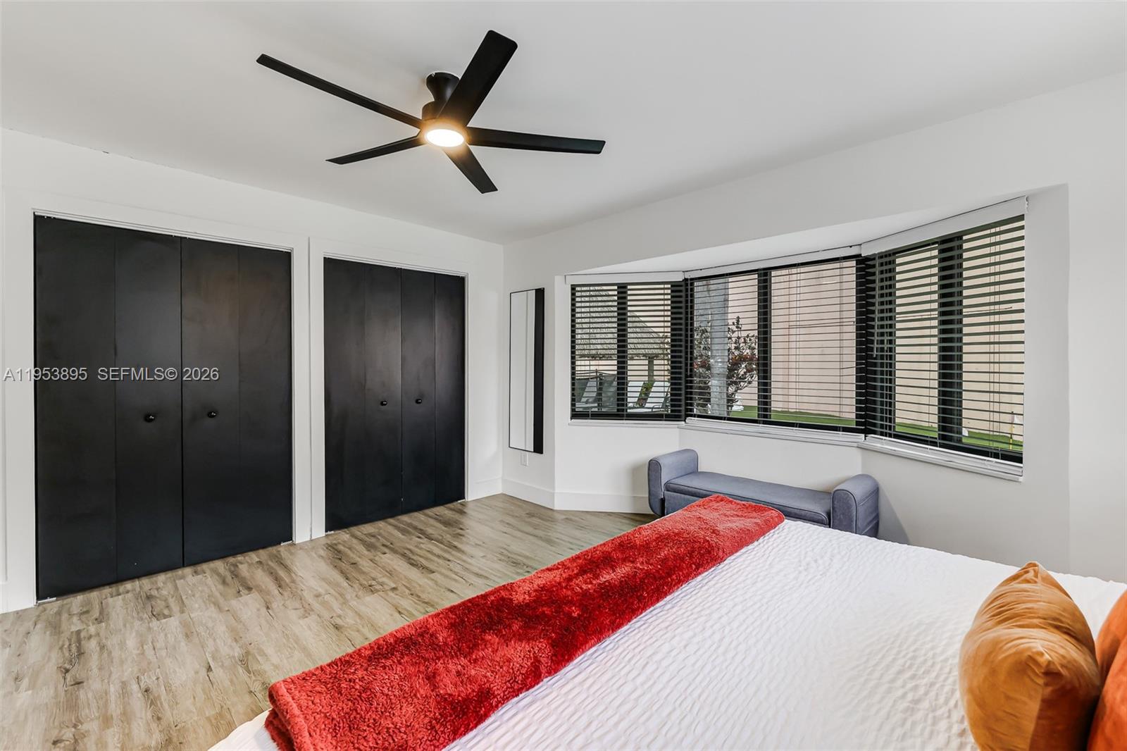 10870 Southwest 106th Avenue Miami, FL 33176 - Photo 29 of 48 a bedroom with a large bed and a large window