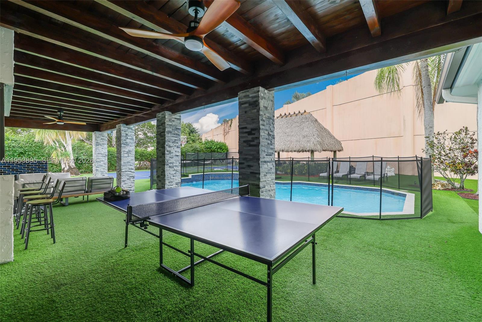 10870 Southwest 106th Avenue Miami, FL 33176 - Photo 35 of 48 a view of yard with table and chairs