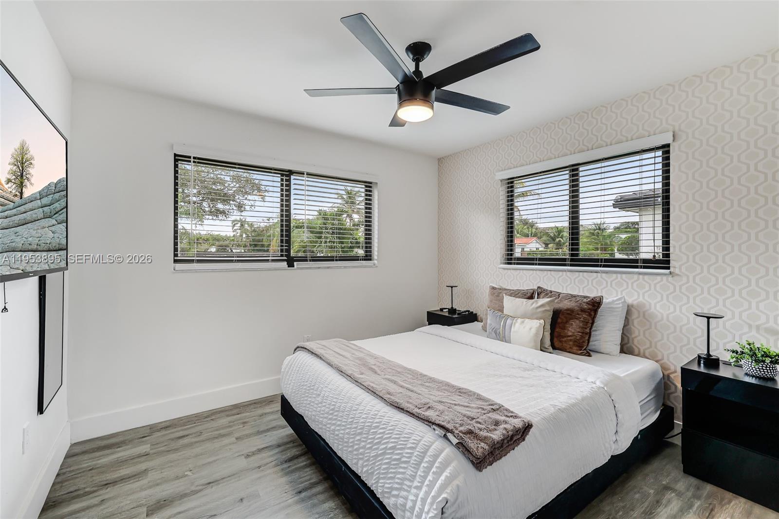 10870 Southwest 106th Avenue Miami, FL 33176 - Photo 10 of 48 a bedroom with a large bed and a window