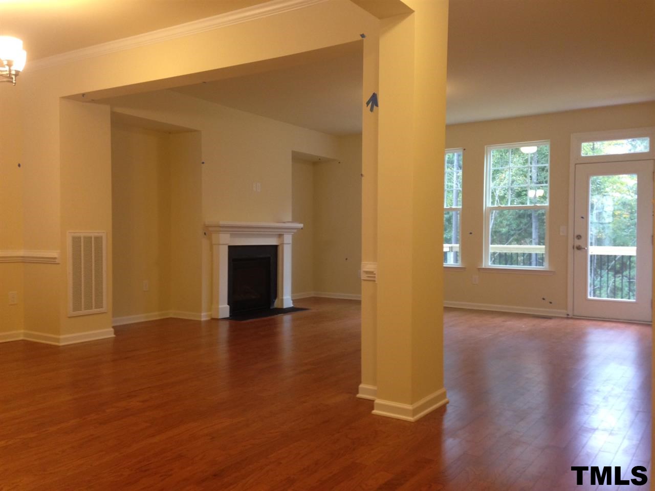 714 Edgewater Ridge Court Apex, NC 27523 - Photo 2 of 8 View thru dining room to family room. Home has all hardwoods on the main floor.
