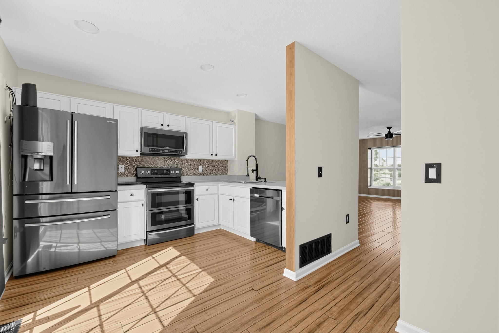 6241 Needletail Road, Unit 32 Columbus, OH 43230 - Photo 12 of 19 12_6241_Needletail_Rd-Kitchen-3580