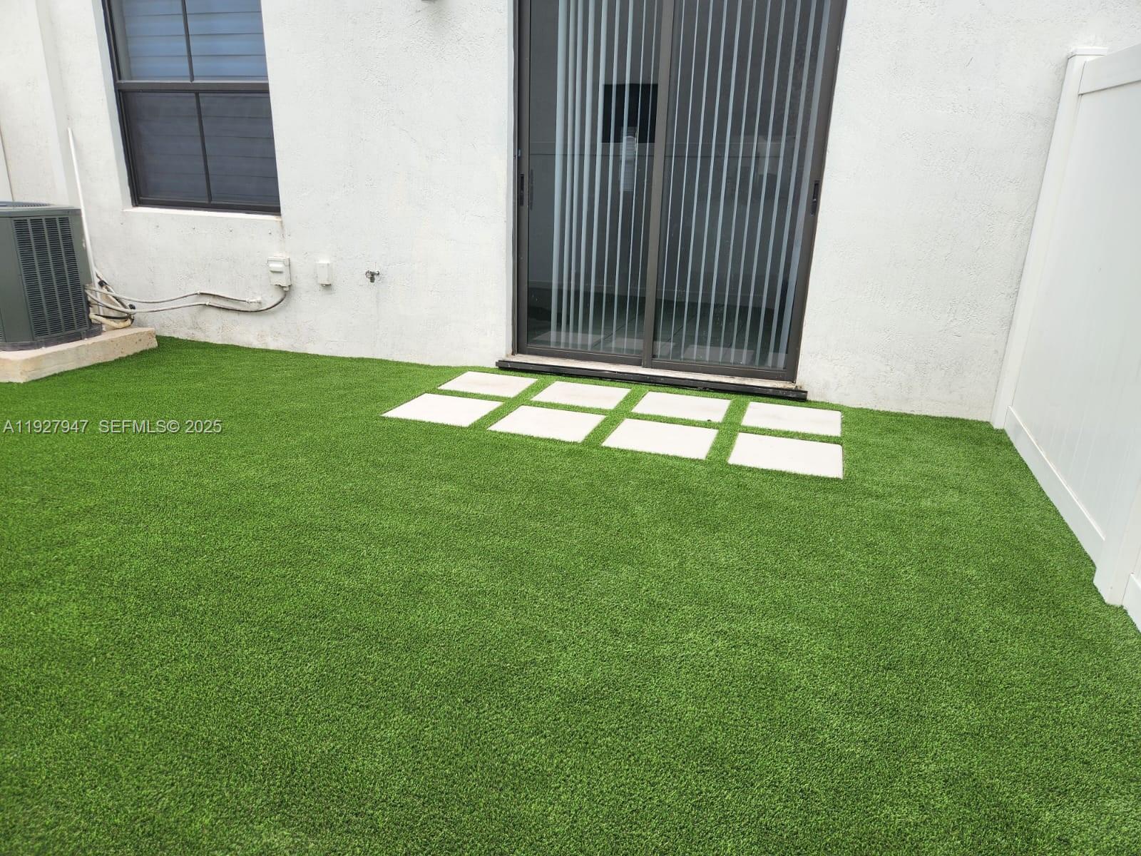 3434 West 104th Terrace Hialeah, FL 33018 - Photo 11 of 28 a view of an outdoor space and a yard