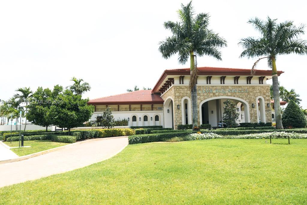 3434 West 104th Terrace Hialeah, FL 33018 - Photo 14 of 28 a front view of house with yard and swimming pool