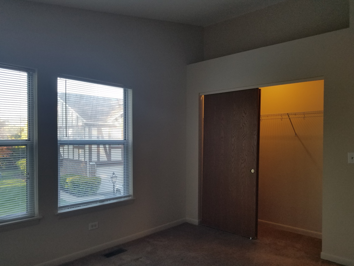 146 West Golf Road, Unit C Libertyville, IL 60048 - Photo 14 of 24 a view of an empty room with a window