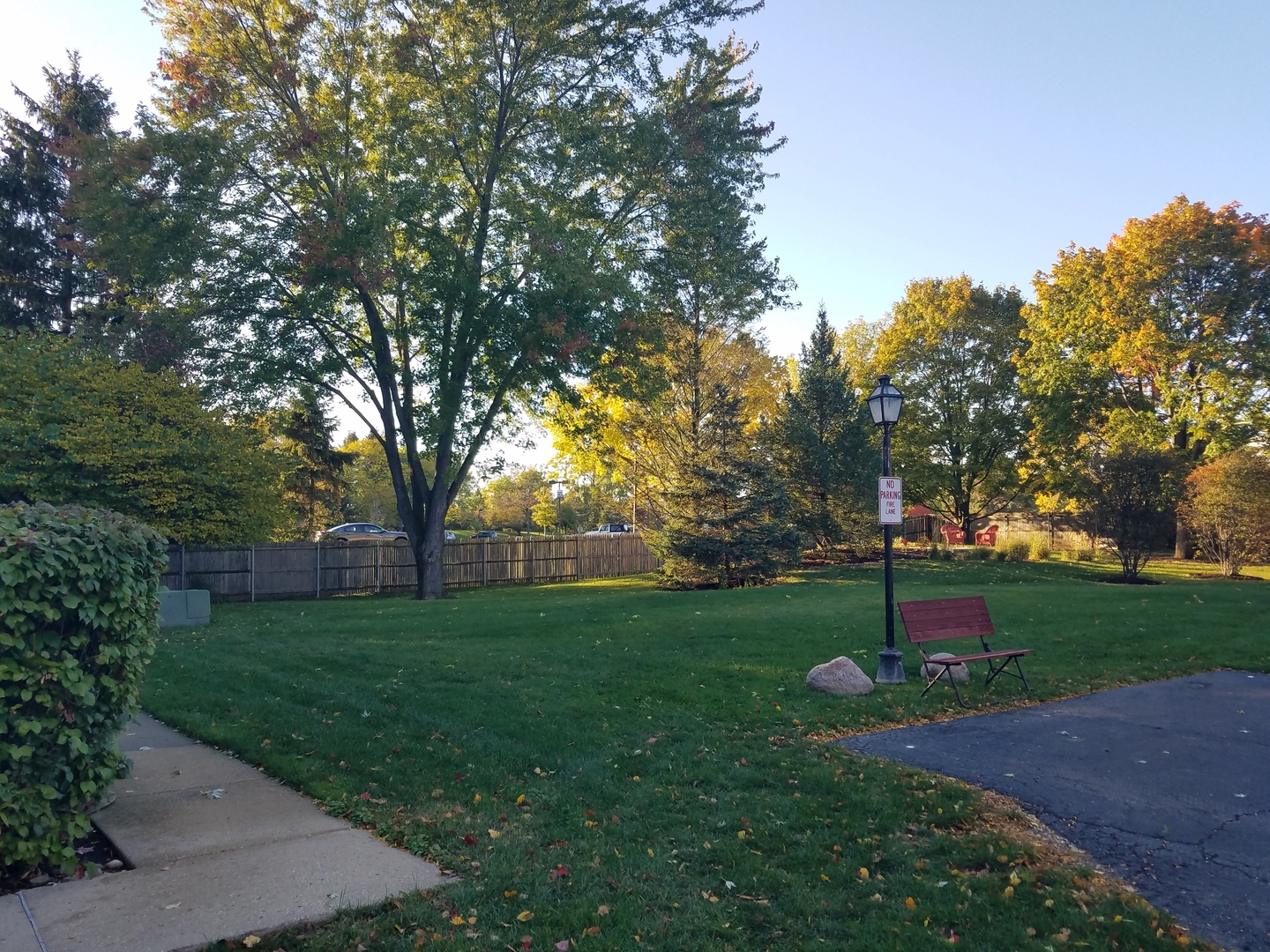 146 West Golf Road, Unit C Libertyville, IL 60048 - Photo 3 of 24 a green field with lots of trees in the background