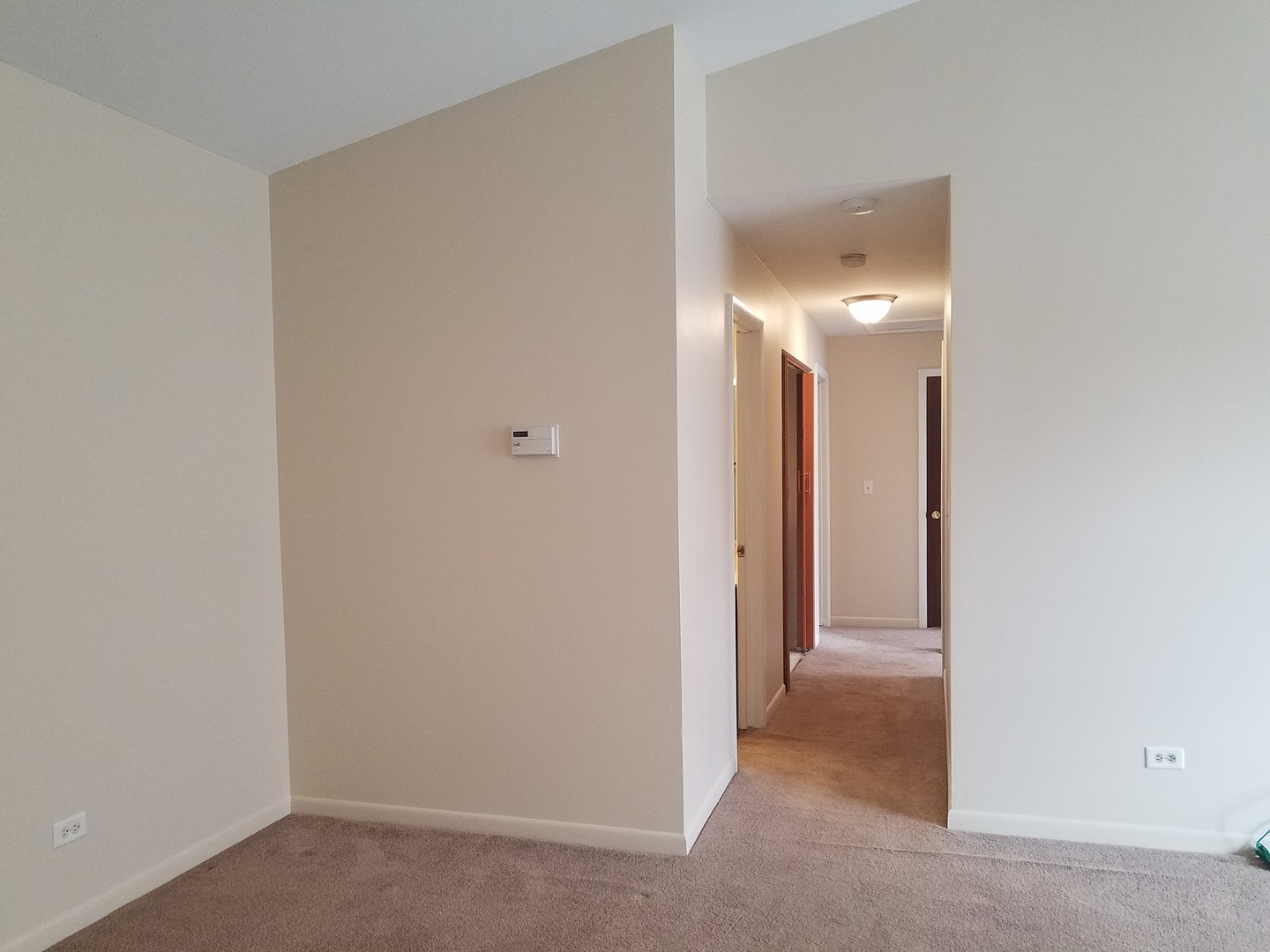 146 West Golf Road, Unit C Libertyville, IL 60048 - Photo 10 of 24 a view of a room with a hallway