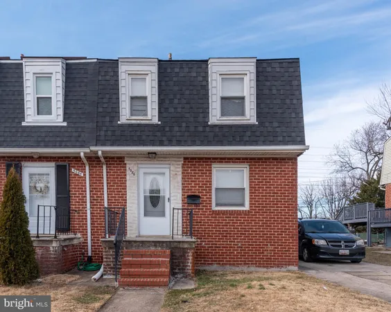 a front view of a house with parking