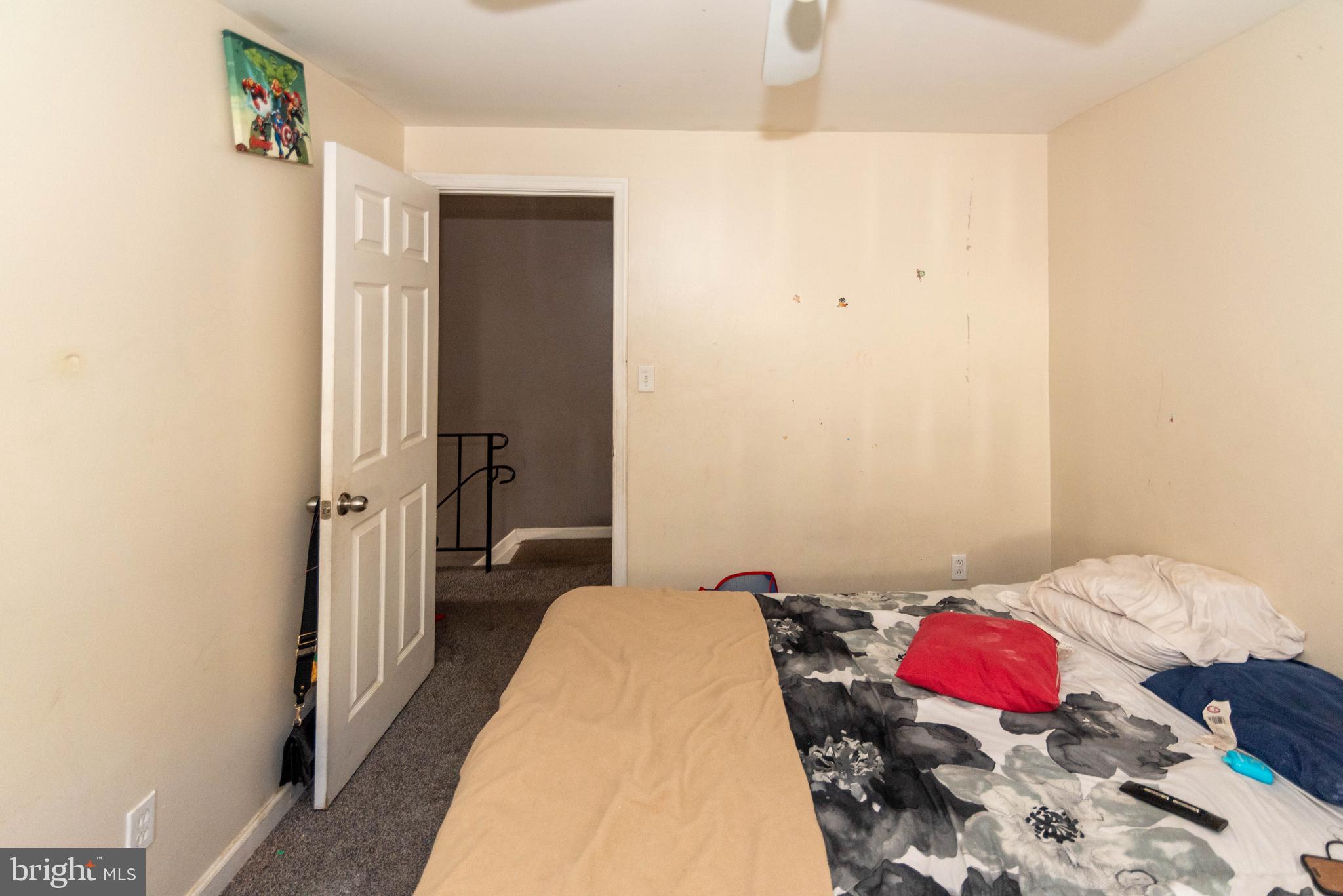 5686 Utrecht Road Baltimore, MD 21206 - Photo 11 of 35 a bedroom with a bed and a closet