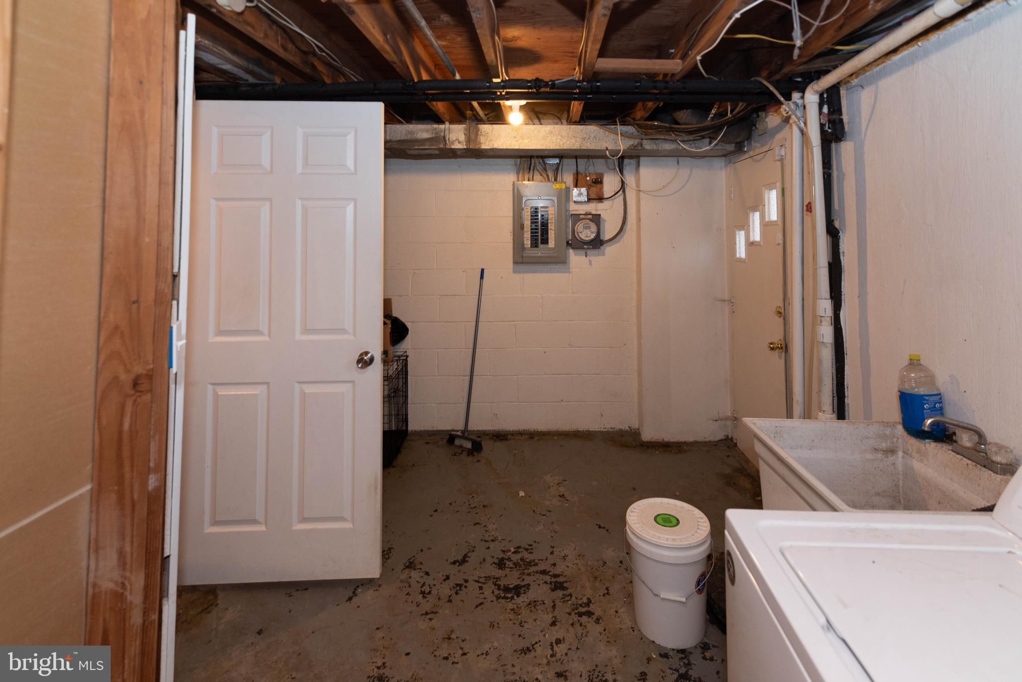 5686 Utrecht Road Baltimore, MD 21206 - Photo 29 of 35 a bathroom with a toilet and a sink