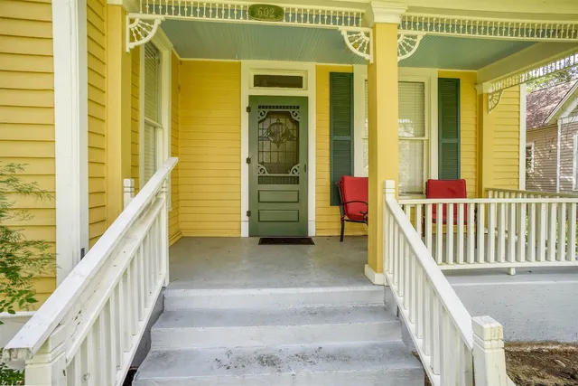 a view of a balcony with staircase