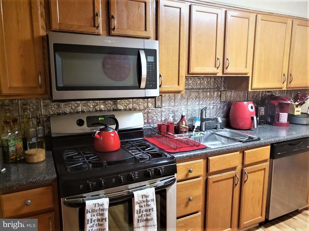 1918 Hillenwood Road Baltimore, MD 21239 - Photo 13 of 41 Gas range with builtin microwave