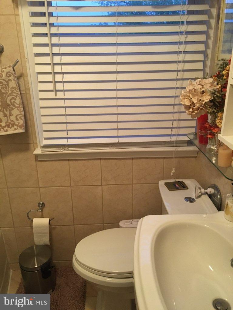 1918 Hillenwood Road Baltimore, MD 21239 - Photo 25 of 41 Updated tile bathroom