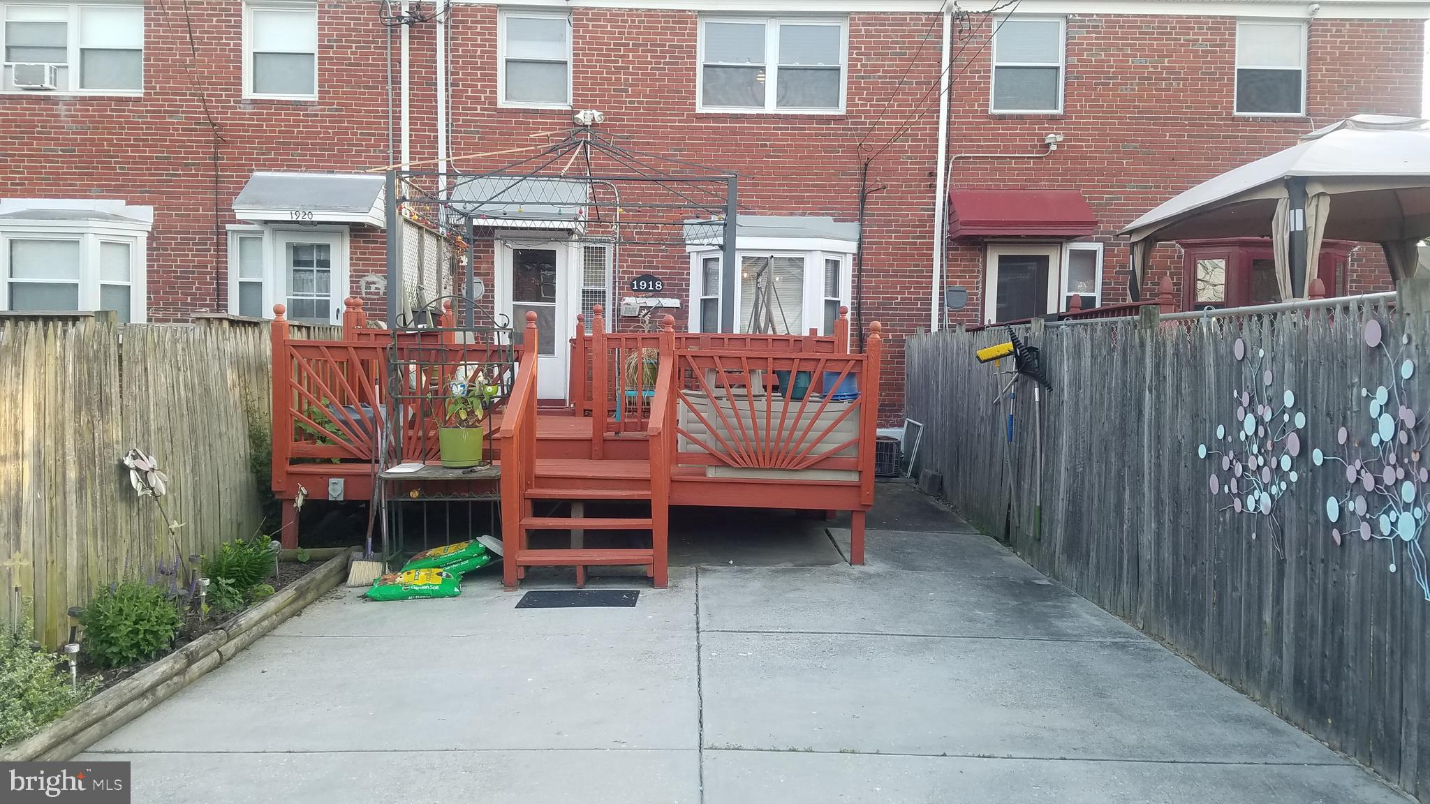 1918 Hillenwood Road Baltimore, MD 21239 - Photo 30 of 41 Back deck with seasonal gazebo