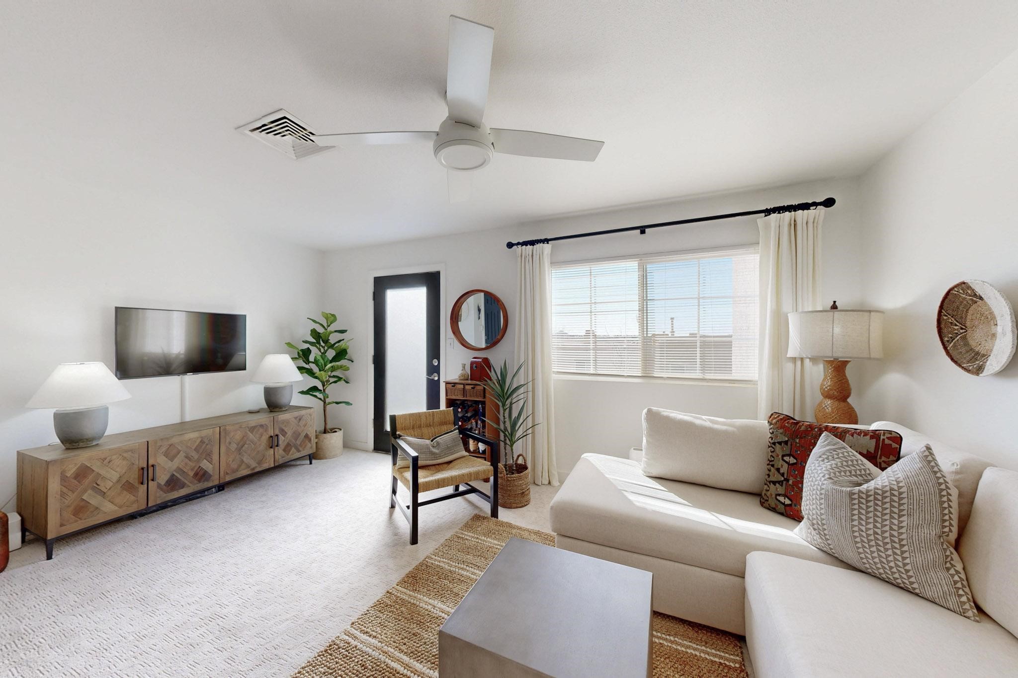 Living area with front porch and views of the mountains