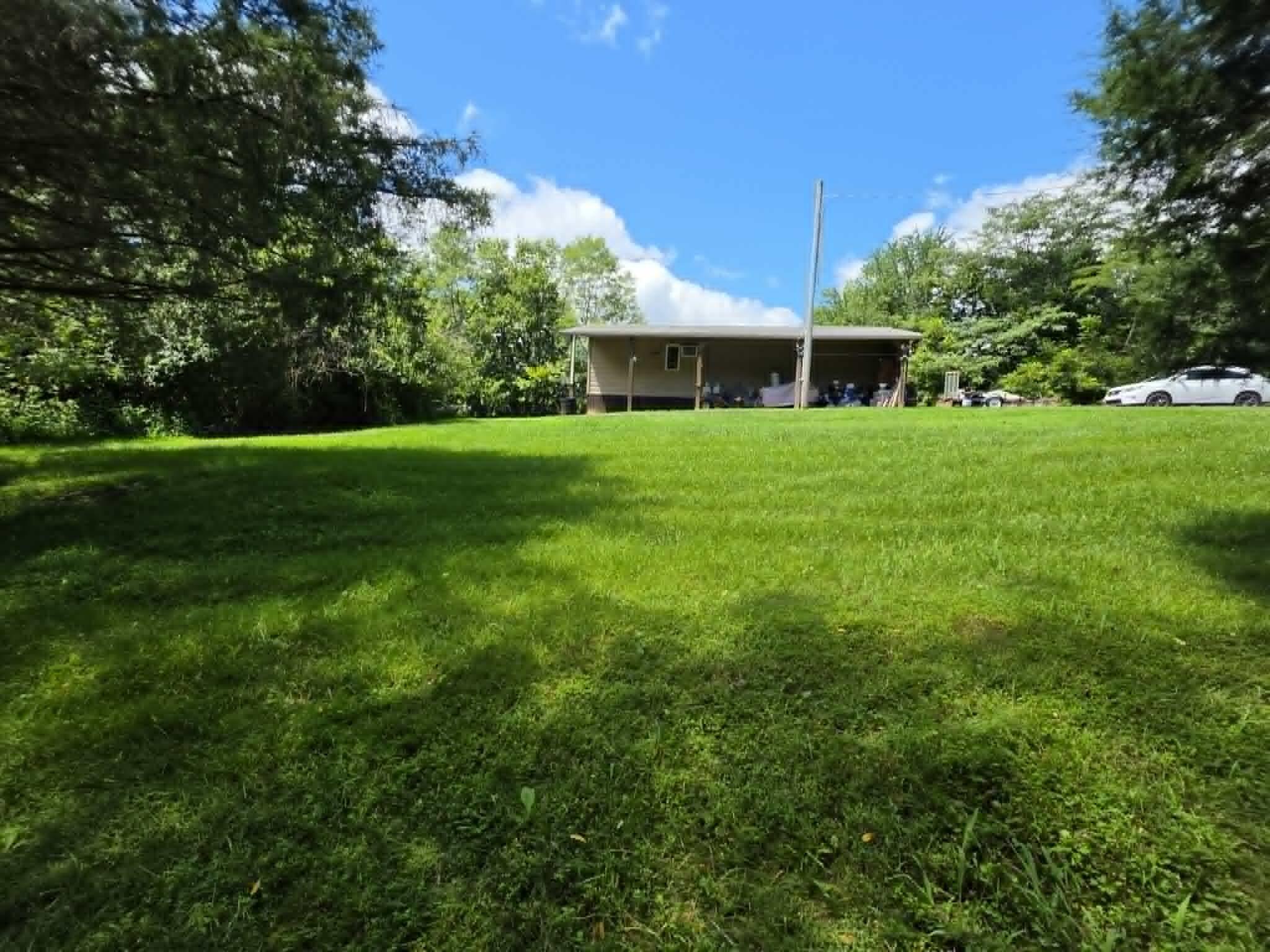 811 Hickory Ridge Road Waddy, KY 40076 - Photo 21 of 79 cabin back side view