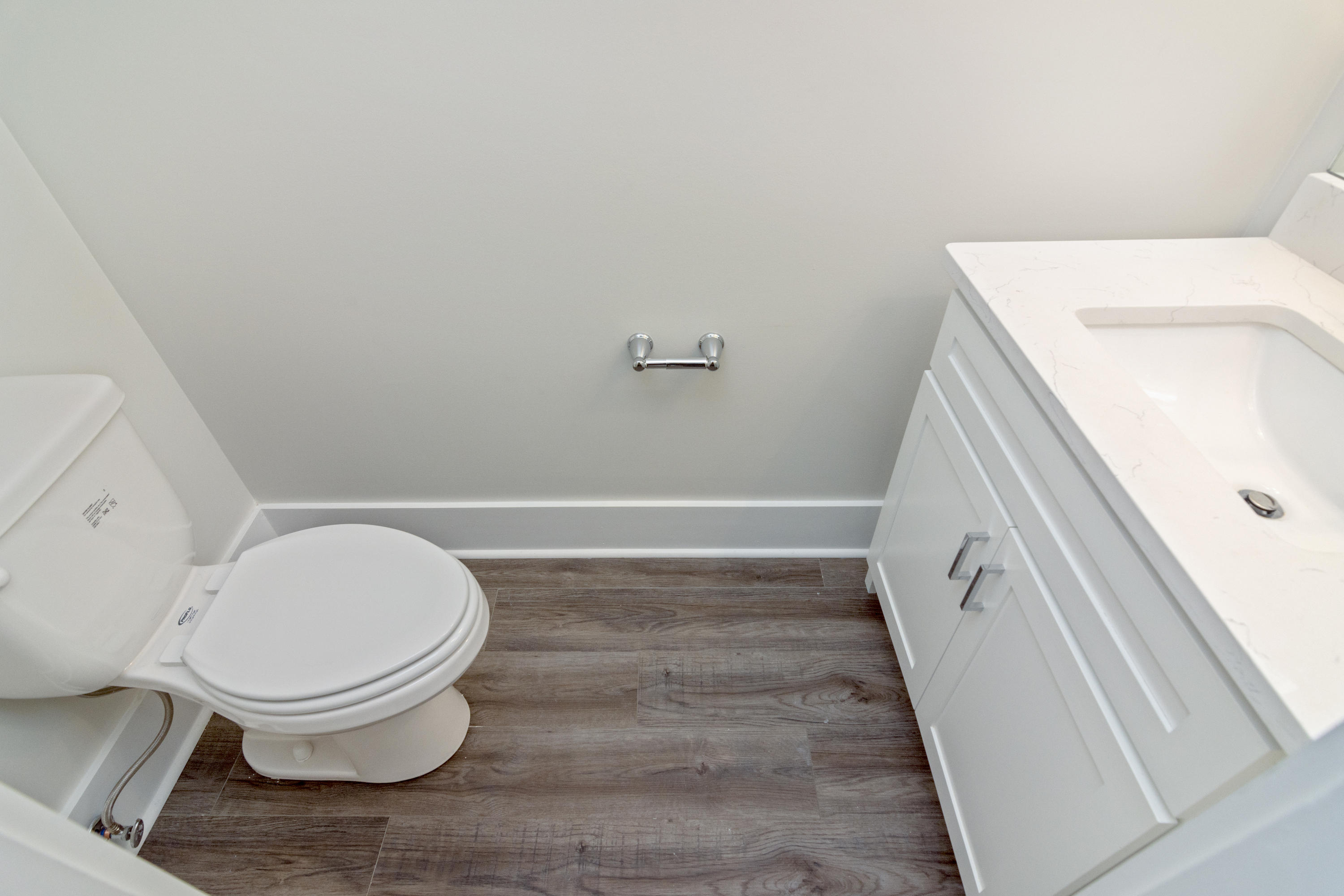 16 Lake Mist Ln Inlet Beach Inlet Beach, FL 32461 - Photo 18 of 45 a bathroom with a sink and a toilet