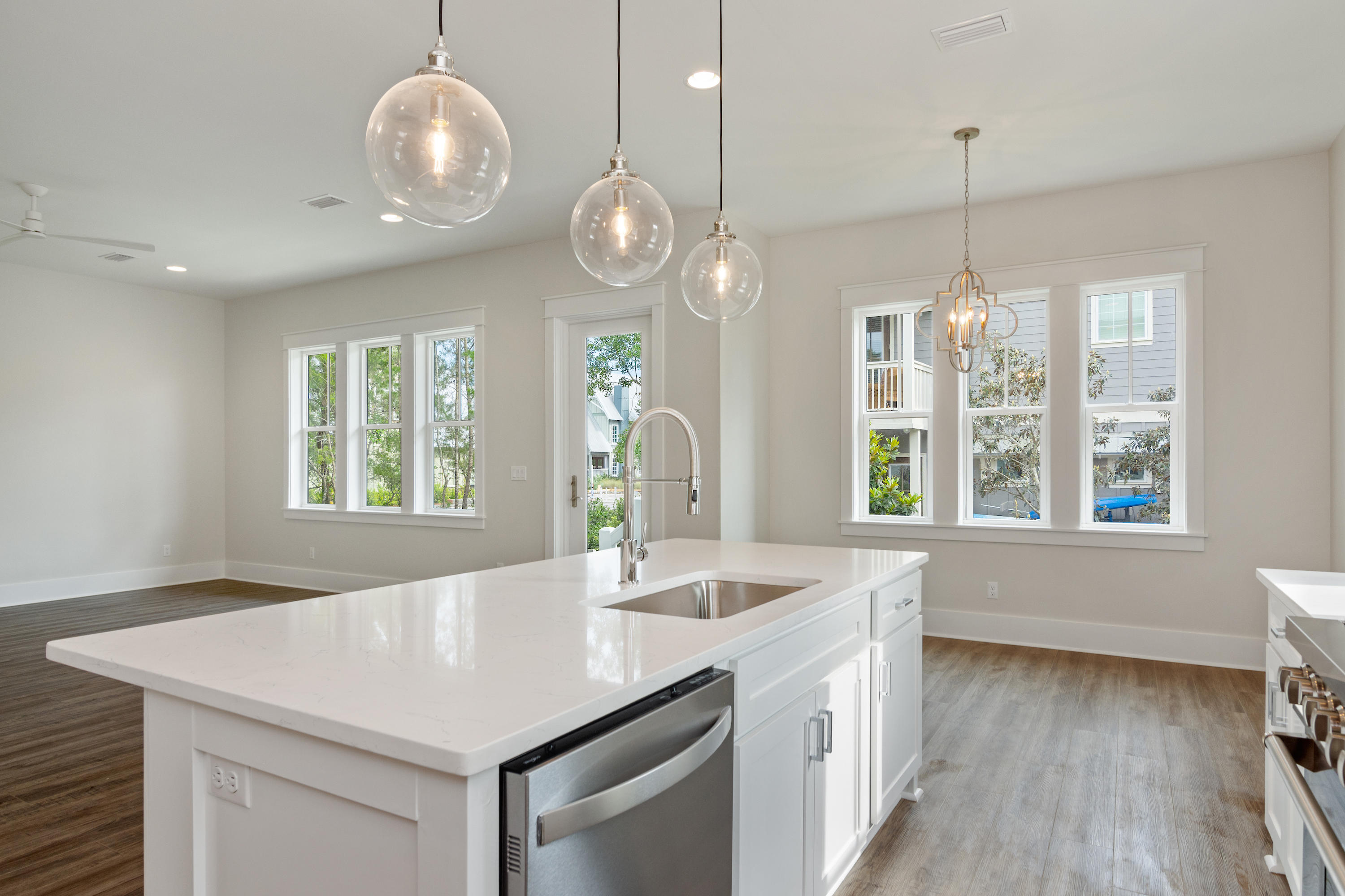 16 Lake Mist Ln Inlet Beach Inlet Beach, FL 32461 - Photo 8 of 45 a kitchen with a sink center island and windows