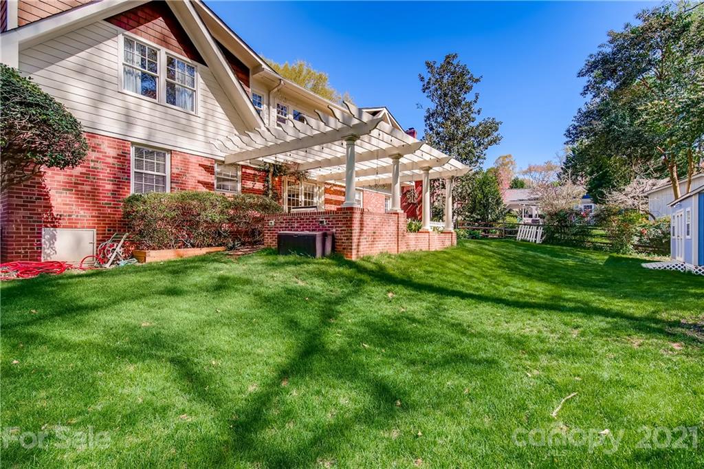 3929 Glenfall Avenue Charlotte, NC 28210 - Photo 30 of 30 a view of a building with a yard