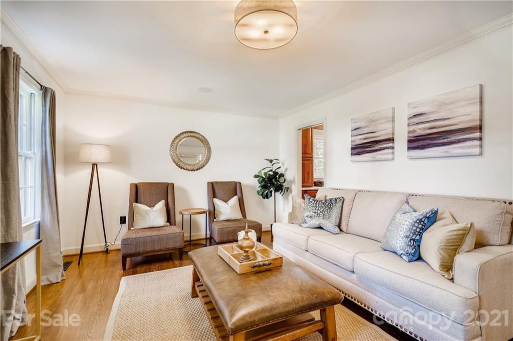 3929 Glenfall Avenue Charlotte, NC 28210 - Photo 4 of 30 a living room with furniture a rug and a large window