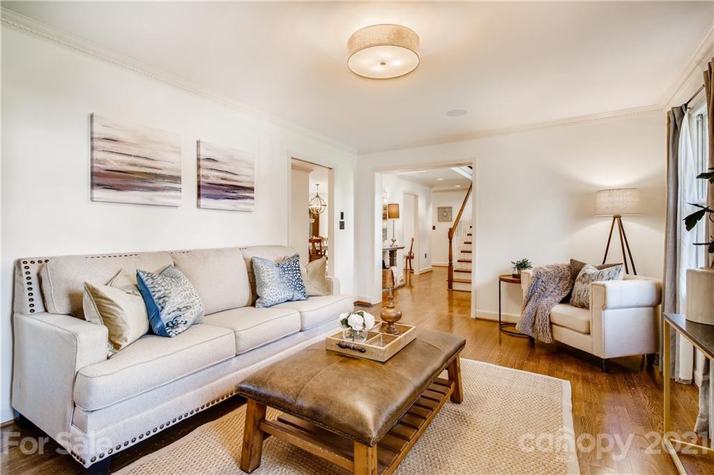 3929 Glenfall Avenue Charlotte, NC 28210 - Photo 5 of 30 a living room with furniture and wooden floor