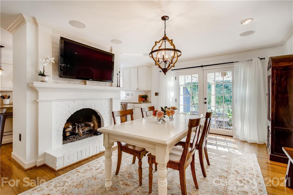 3929 Glenfall Avenue Charlotte, NC 28210 - Photo 10 of 30 a view of a livingroom with furniture fireplace and flat screen tv